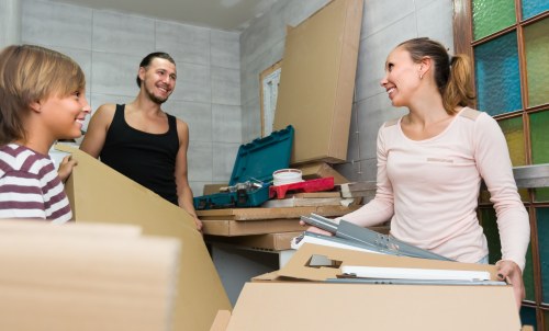 Professional packing crew handling boxes at Storage West Kensington