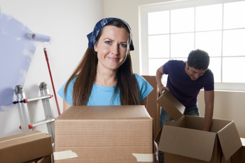 Experienced moving professionals handling belongings