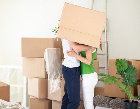 Man with Van unloading furniture at a new West Kensington home